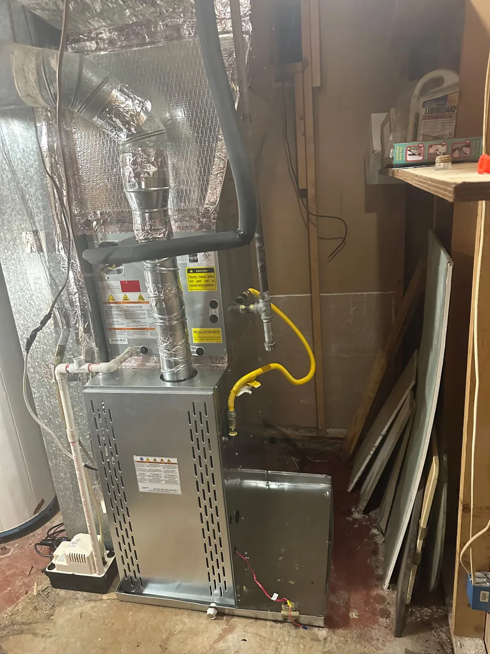 New gas furnace installed in the same basement after replacement